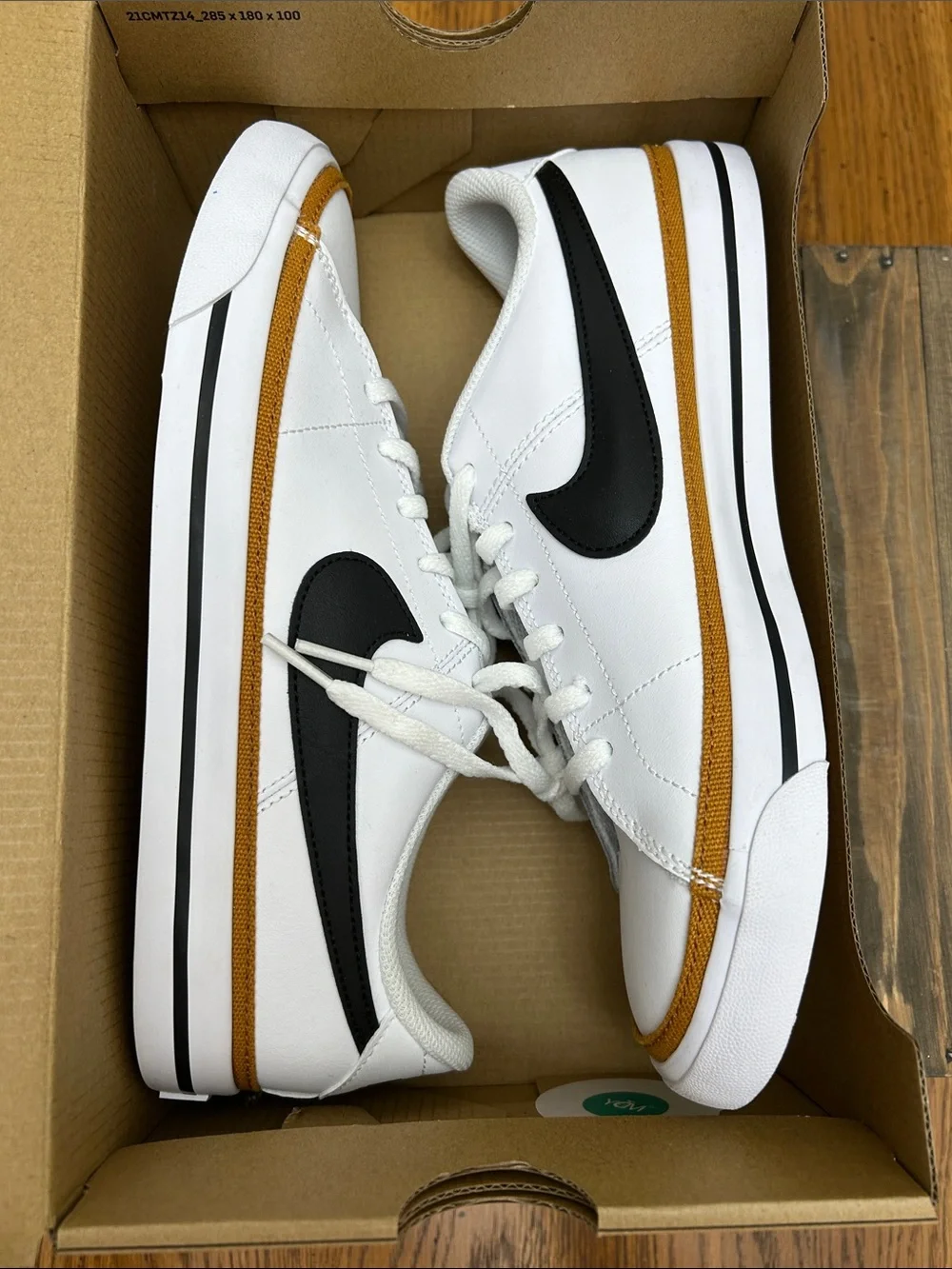 NWT Nike White Leather Sneakers with Black Swoosh and Gold Trim W9 M7.5